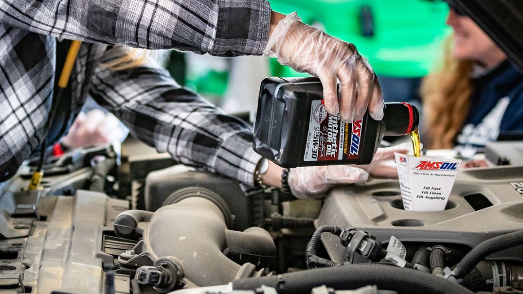 Mix AMSOIL synthetic motor oil with conventional oil