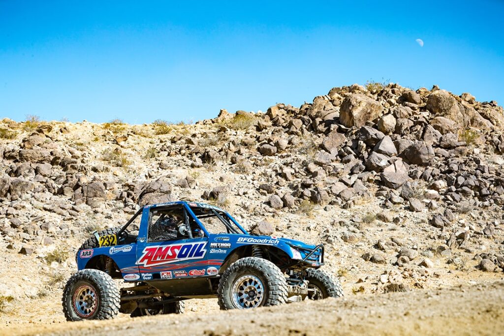 Amsoil terrain truck on a dirt path