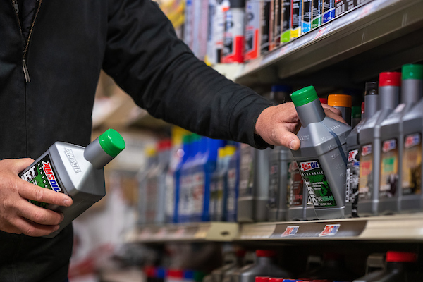 AMSOIL blog image - taking AMSOIL oil off the shelf