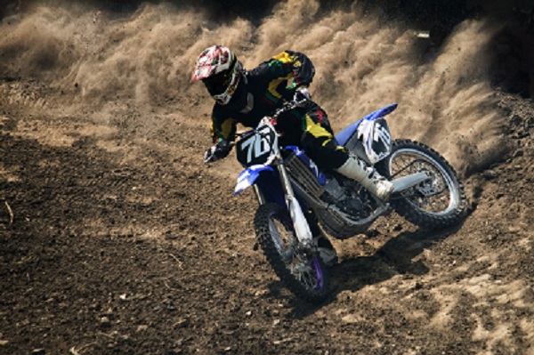 AMSOIL dirt bike motorcycle going down track